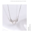 Angel Wing Ring Necklace Necklaces Claire & Clara
