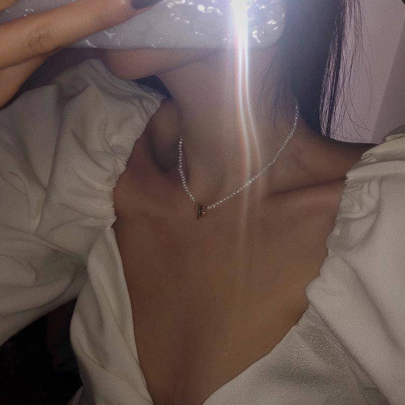 Dainty Flower Pearl Choker Necklace > pearl > pearl choker > pearl necklace > pearl jewellery > pearl choker necklace > pearl beads > white pearl necklace > flower necklace > freshwater pearl necklace > freshwater pearl > choker necklace > choker Claire & Clara