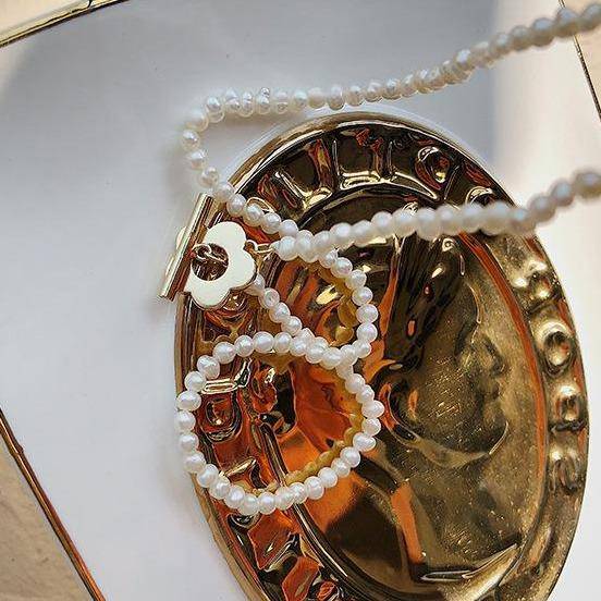 Dainty Flower Pearl Choker Necklace > pearl > pearl choker > pearl necklace > pearl jewellery > pearl choker necklace > pearl beads > white pearl necklace > flower necklace > freshwater pearl necklace > freshwater pearl > choker necklace > choker Claire & Clara