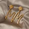 Exaggerated Metal Letter "M" Earrings Earrings Claire & Clara
