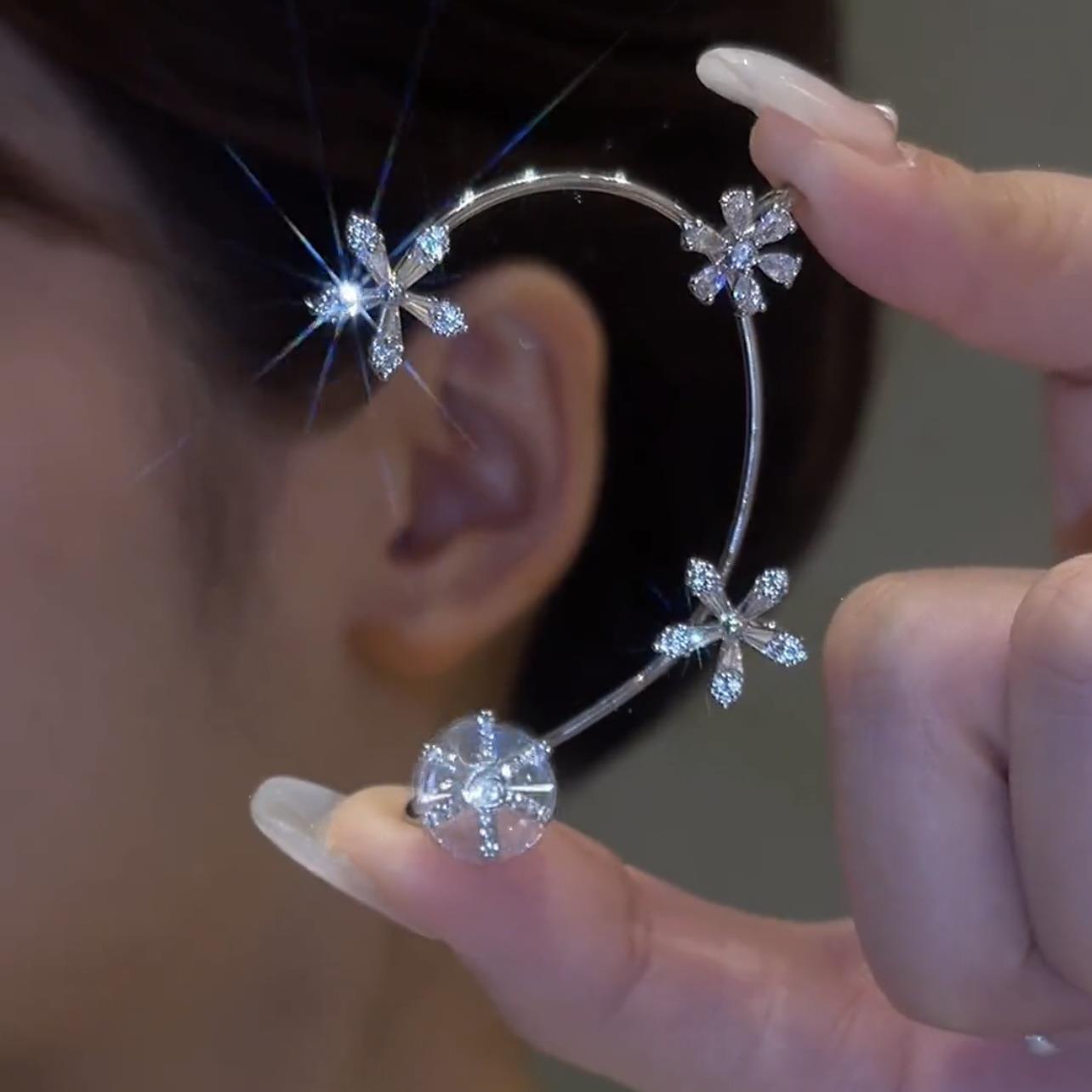Spinning Snowflake Earrings Earrings Claire & Clara