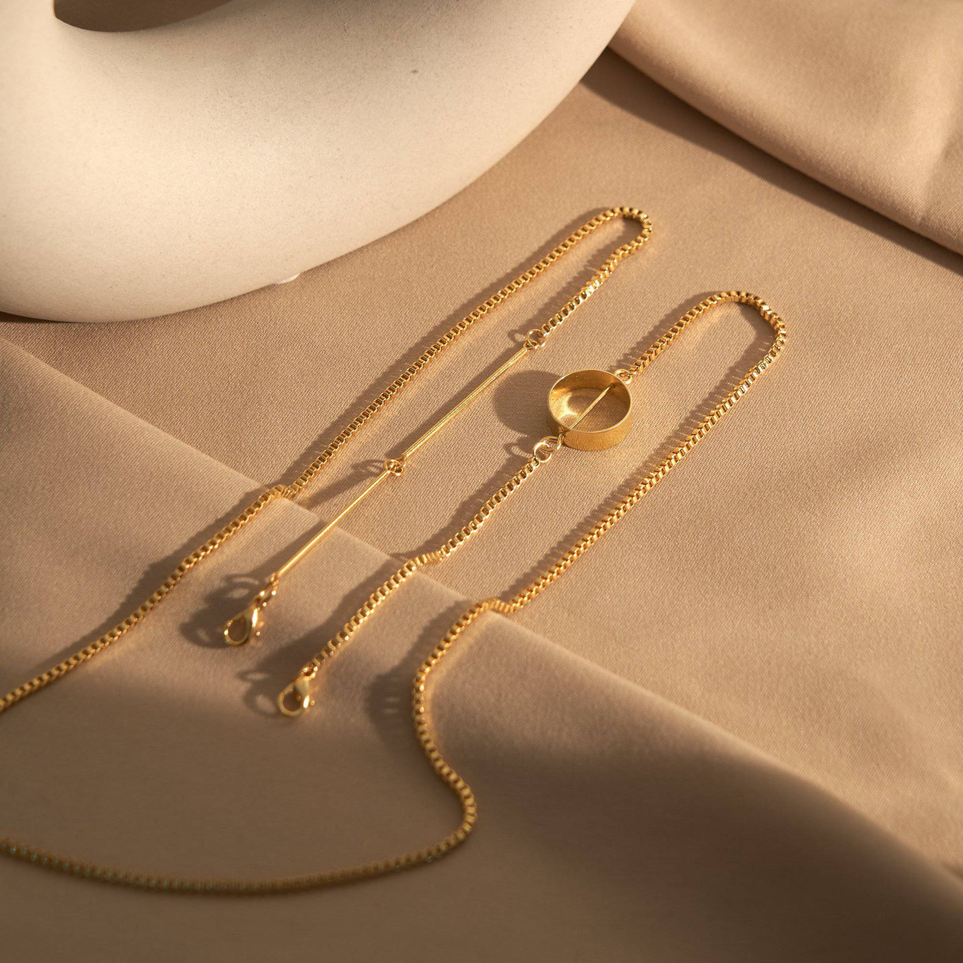 The Ring Sunglass Chain Chains > glasses chain > gold chain > sunglass chain > chain ring > gold chain ring Claire & Clara