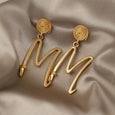 Exaggerated Metal Letter "M" Earrings Earrings Claire & Clara 