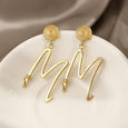 Exaggerated Metal Letter "M" Earrings Earrings Claire & Clara 