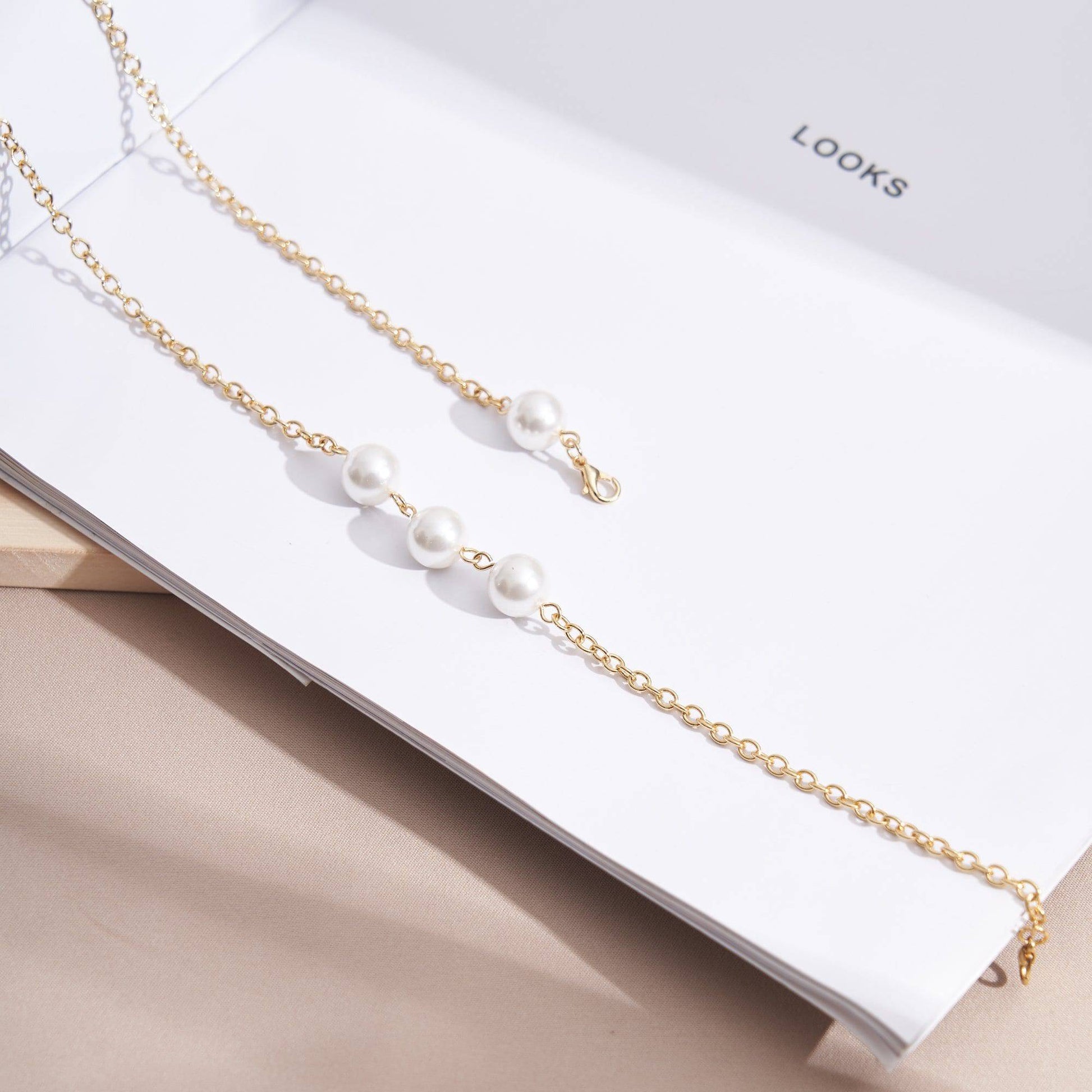Triple Pearls Sunglass Chain Chains > glasses chain > gold chain > sunglass chain > pearl > pearl jewellery Claire & Clara 